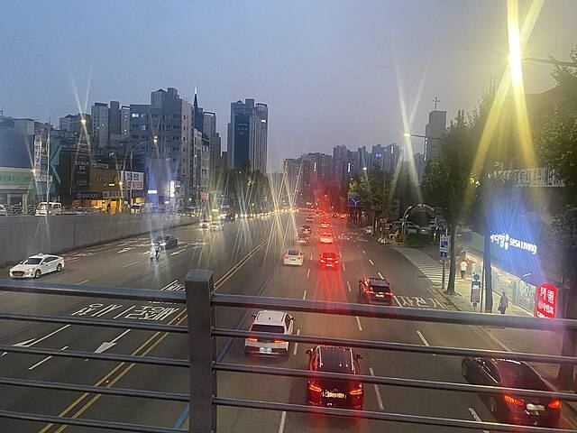 Seoul Travel City Traffic on the freeway and city buildings 1